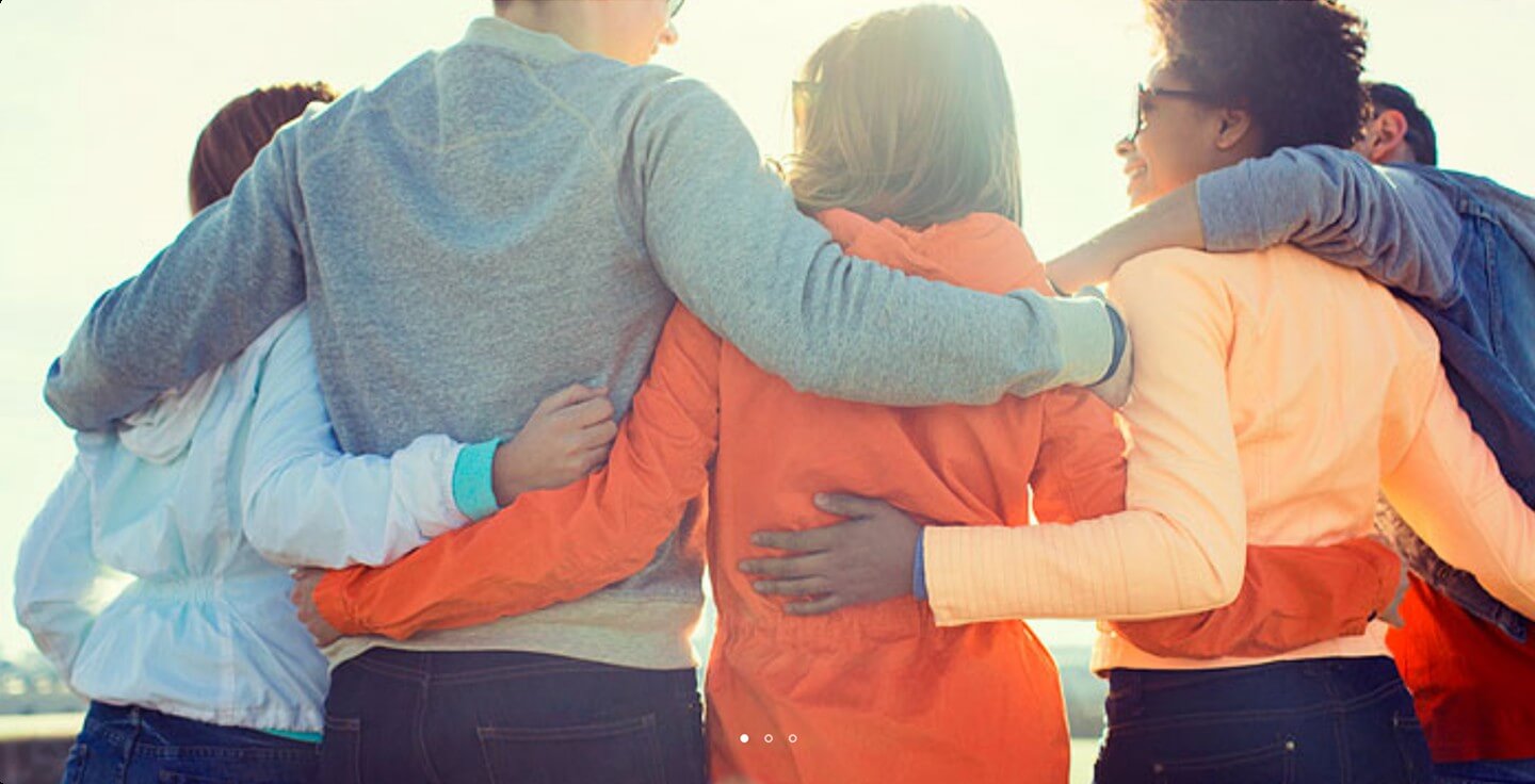 People holding each other in a circle